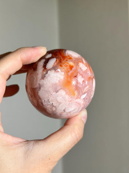 carnelian flower agate sphere with blossoming plumes