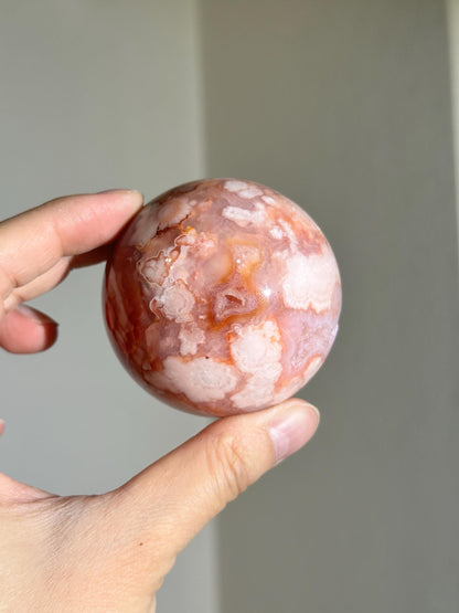 carnelian flower agate sphere with blossoming plumes