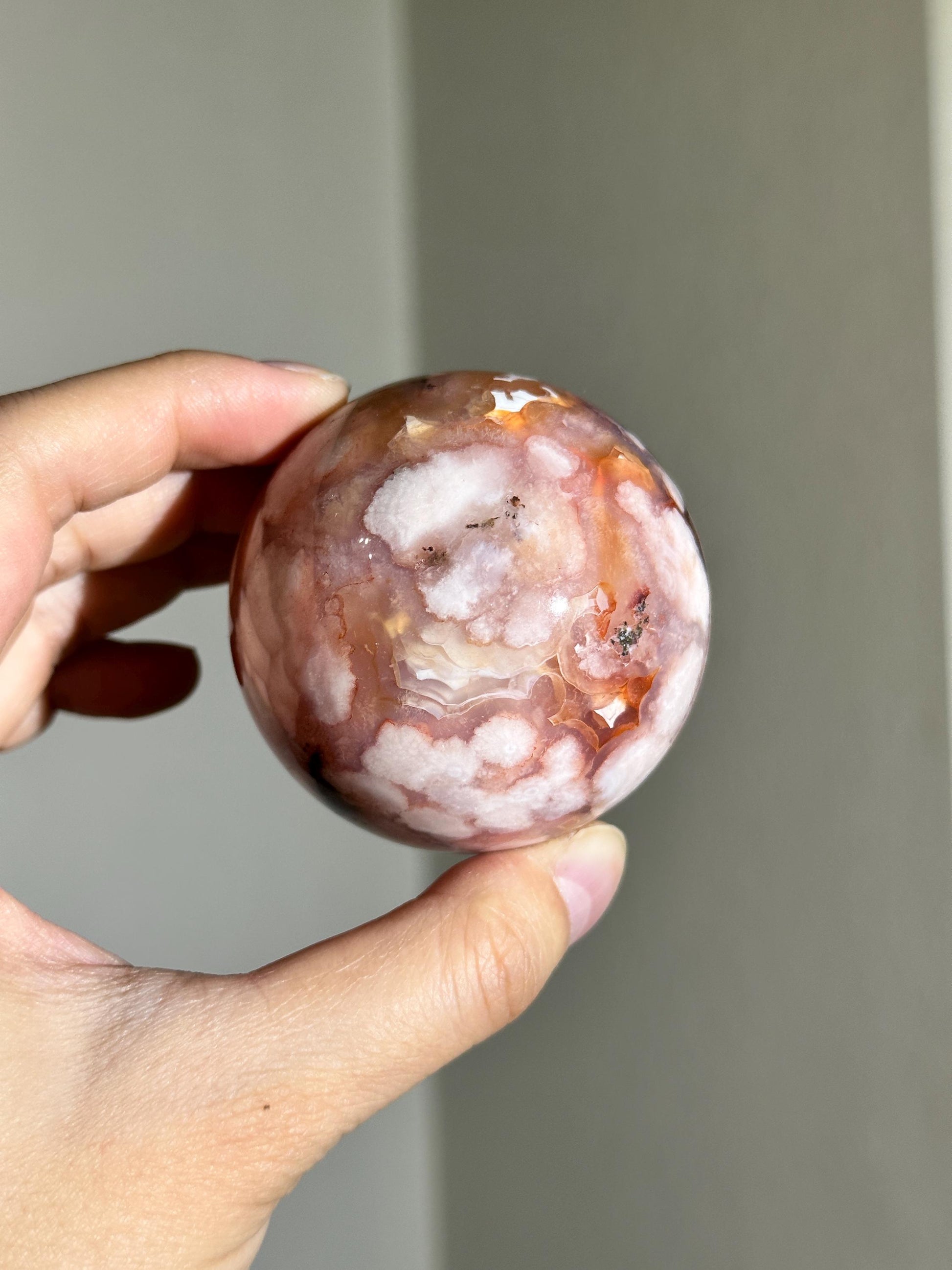 carnelian flower agate sphere with blossoming plumes