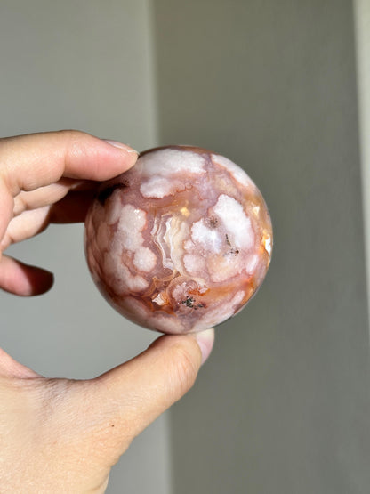 carnelian flower agate sphere with blossoming plumes