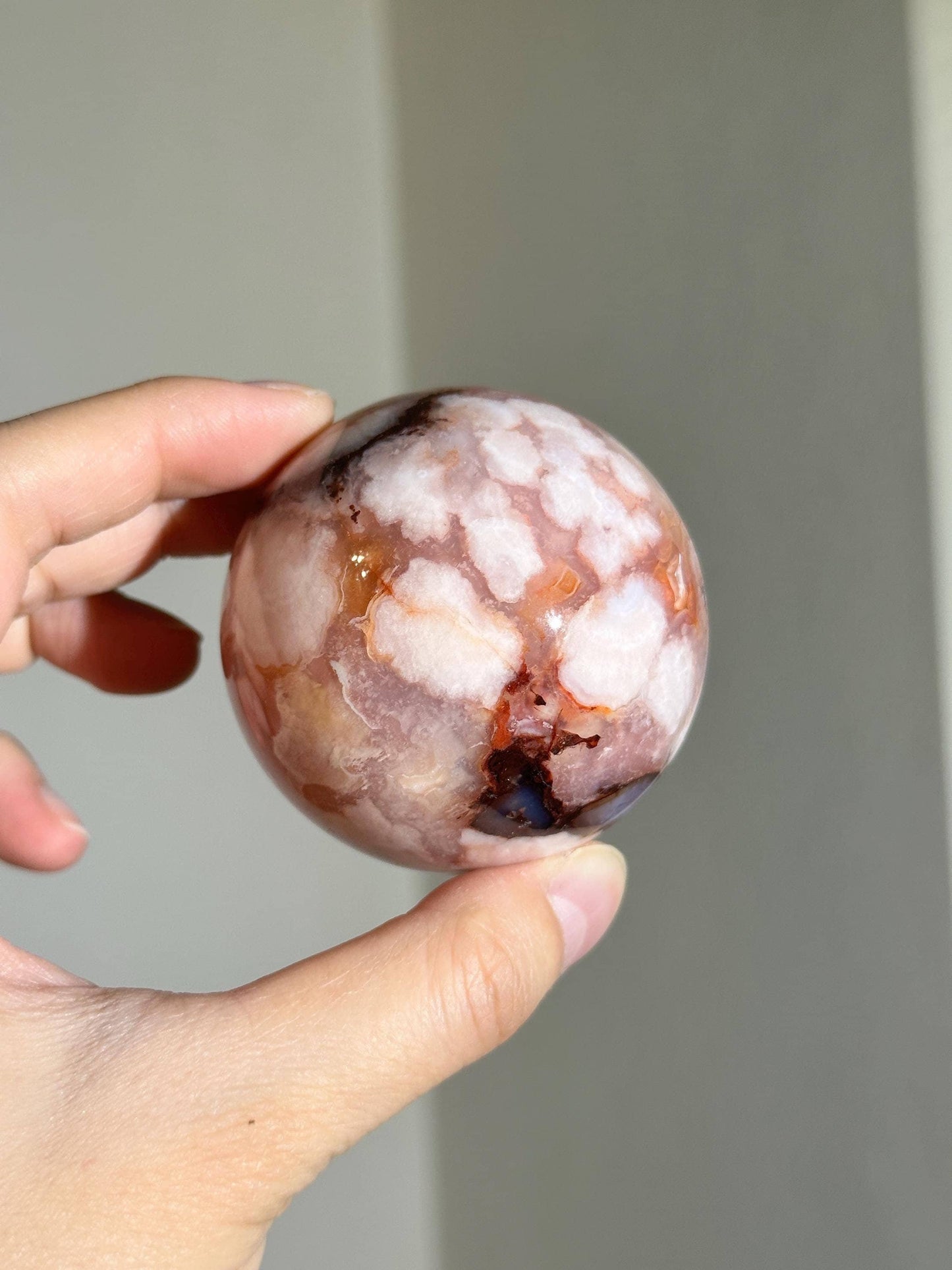 carnelian flower agate sphere with blossoming plumes