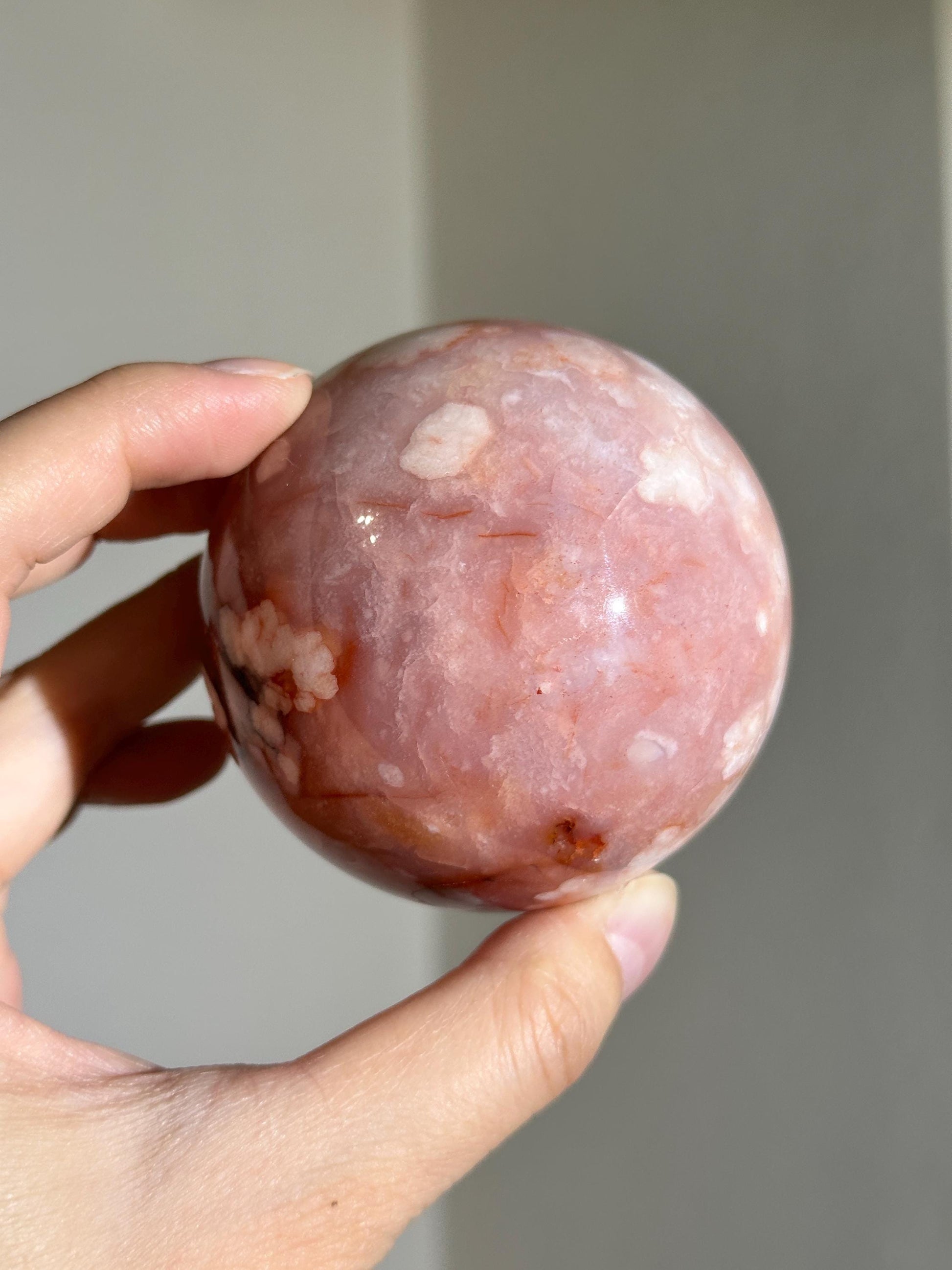 carnelian flower agate sphere with blossoming plumes