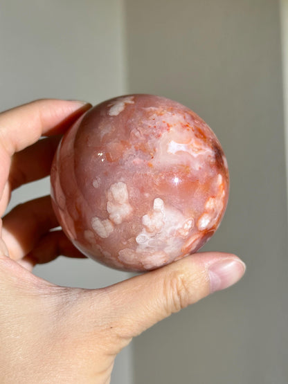 carnelian flower agate sphere with blossoming plumes