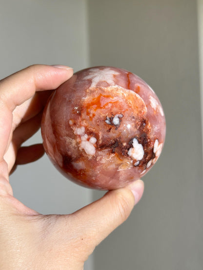 carnelian flower agate sphere with blossoming plumes