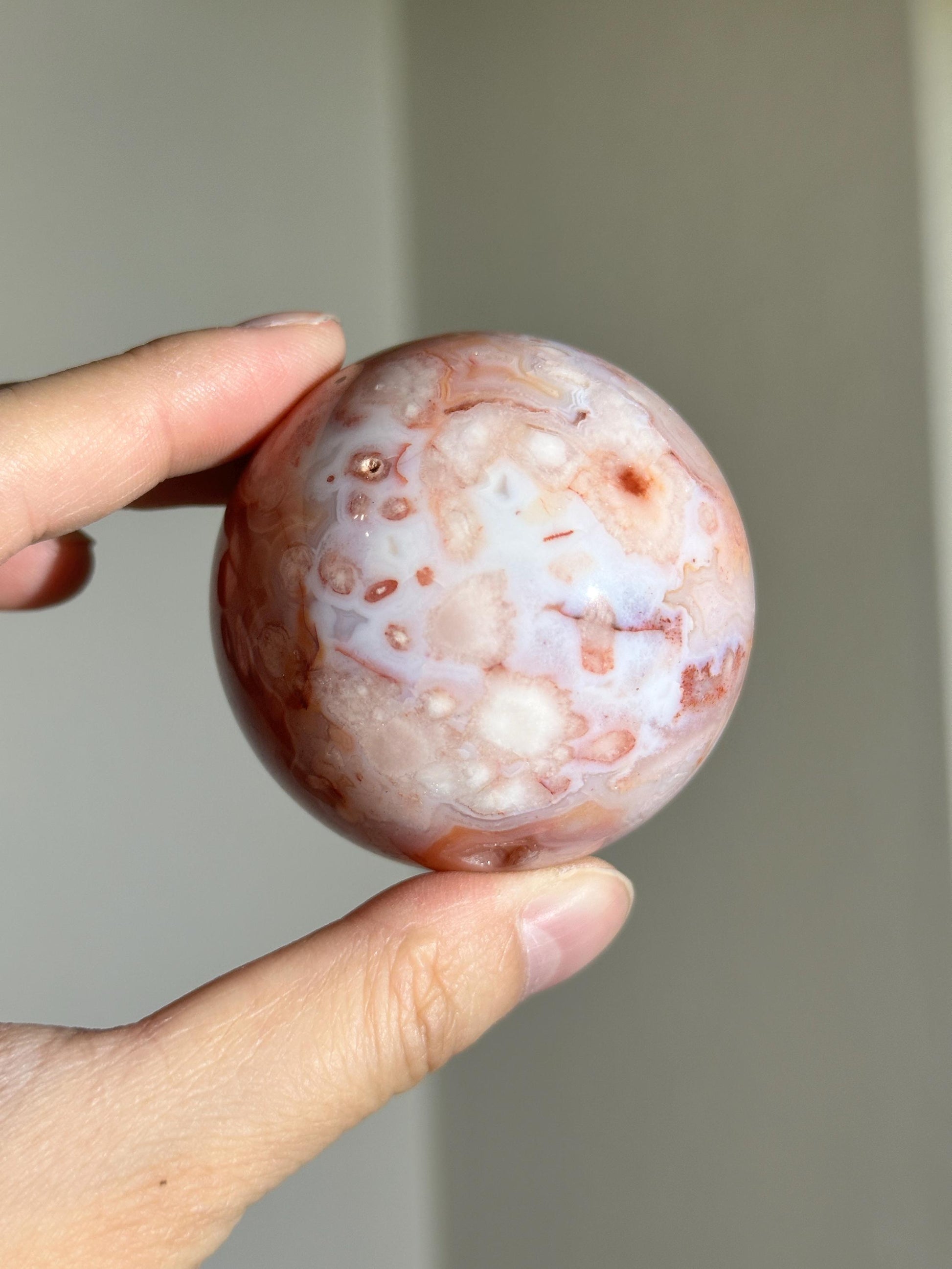 carnelian flower agate sphere with blossoming plumes