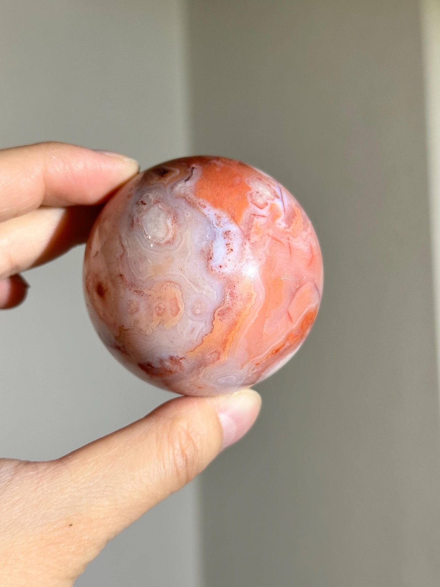 carnelian flower agate sphere with blossoming plumes