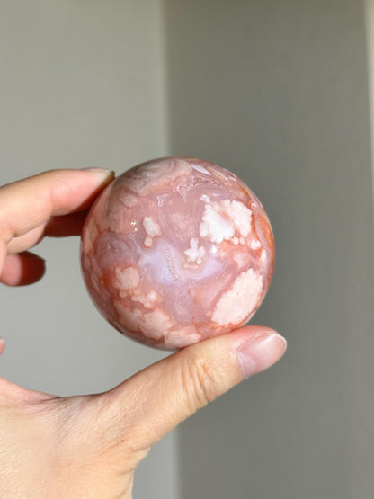 carnelian flower agate sphere with blossoming plumes