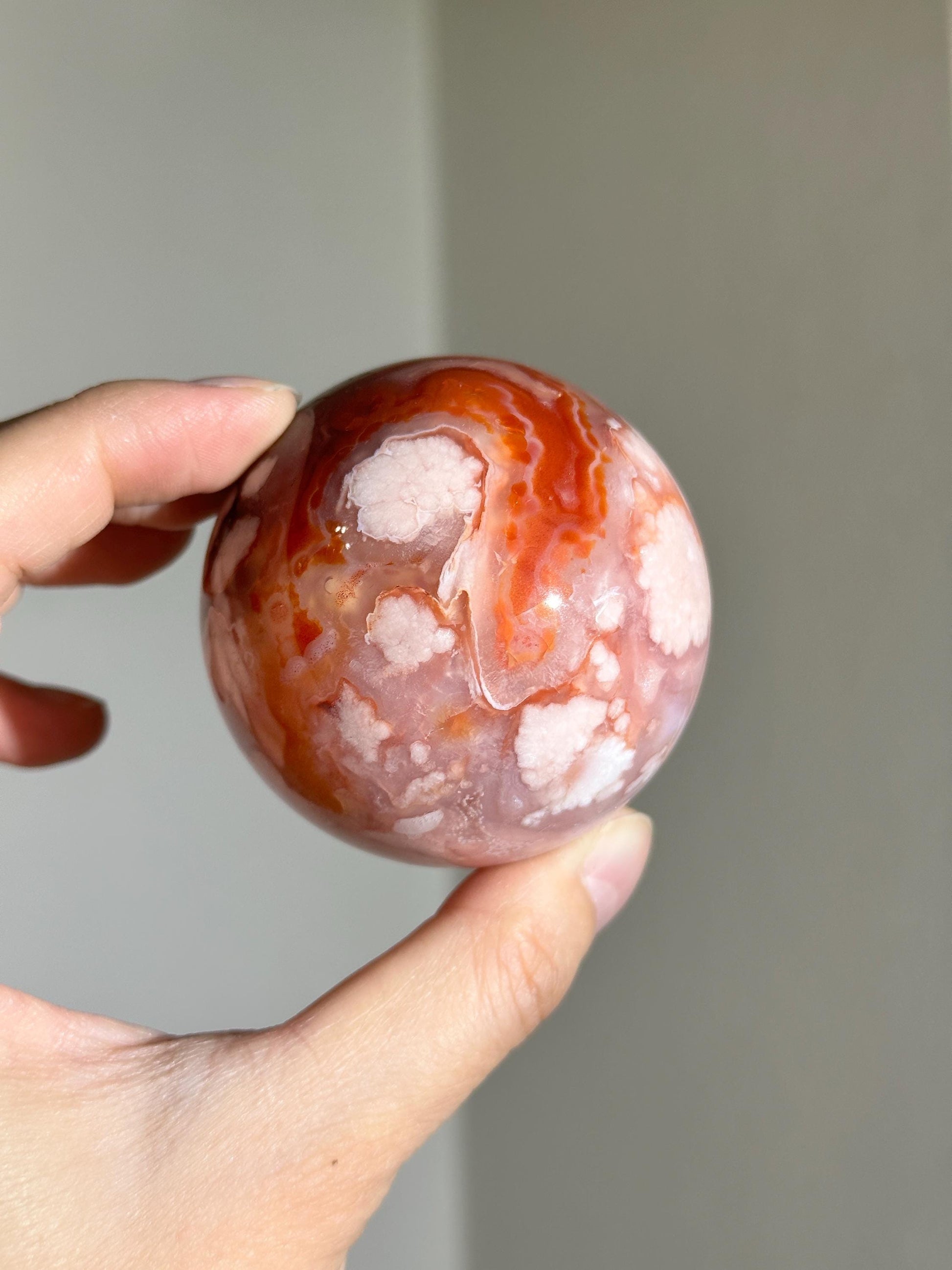 carnelian flower agate sphere with blossoming plumes