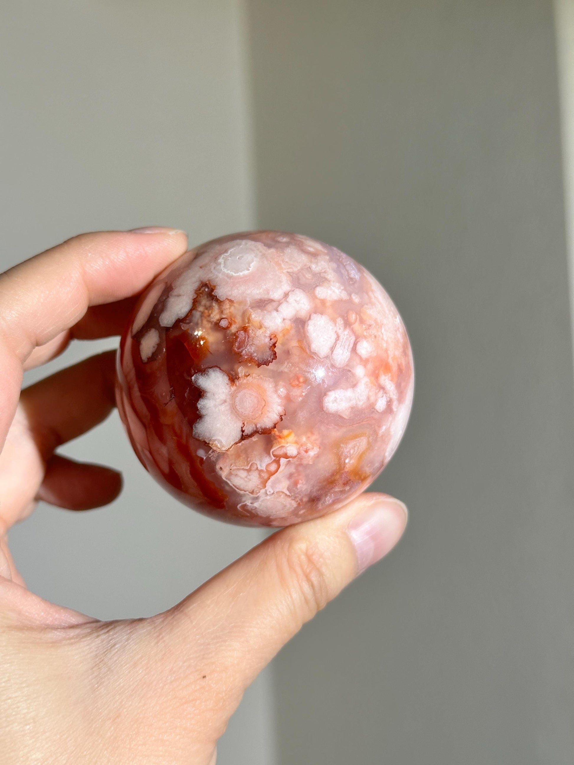 carnelian flower agate sphere with blossoming plumes