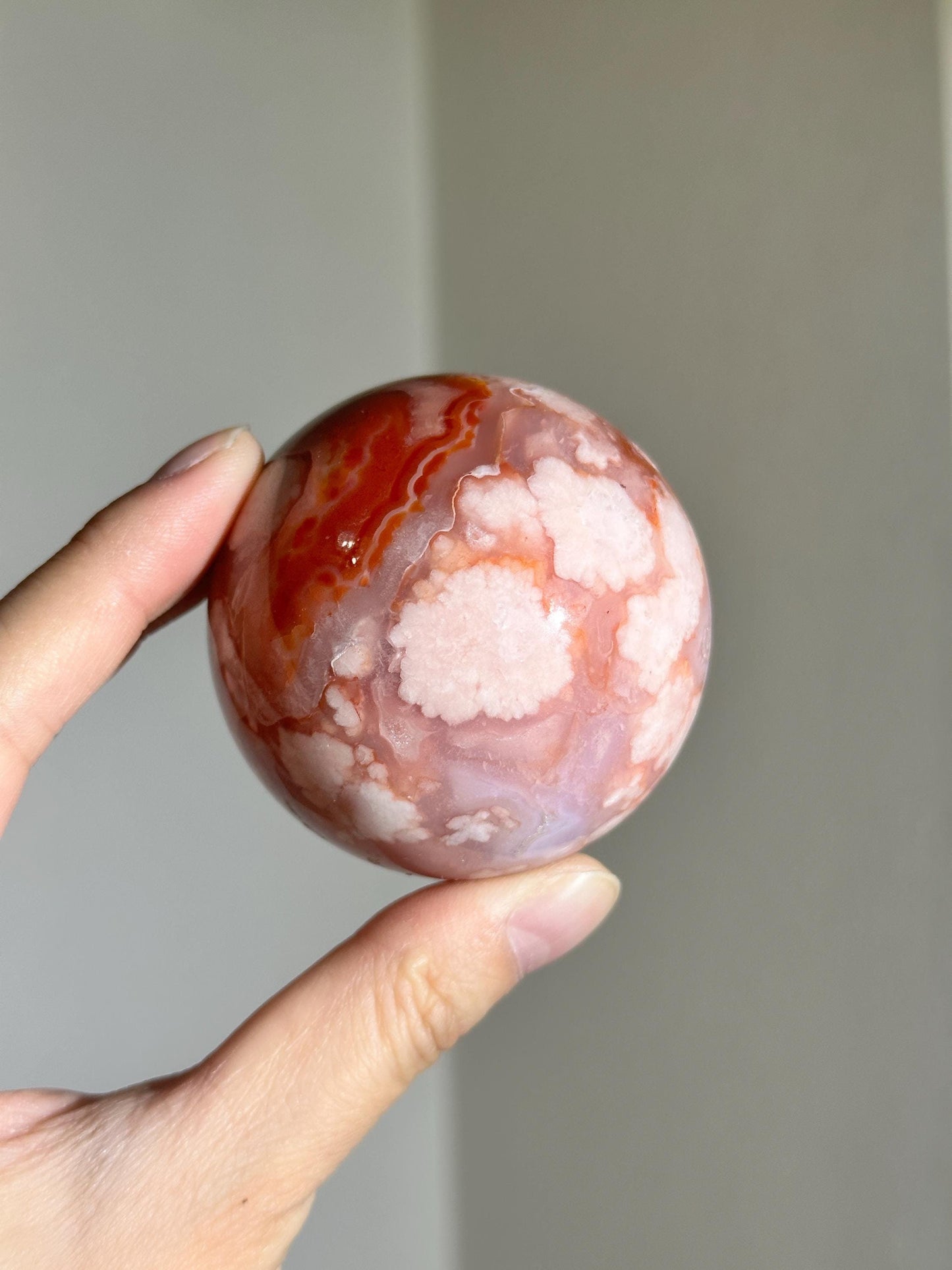 carnelian flower agate sphere with blossoming plumes