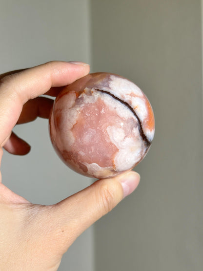 carnelian flower agate sphere with blossoming plumes