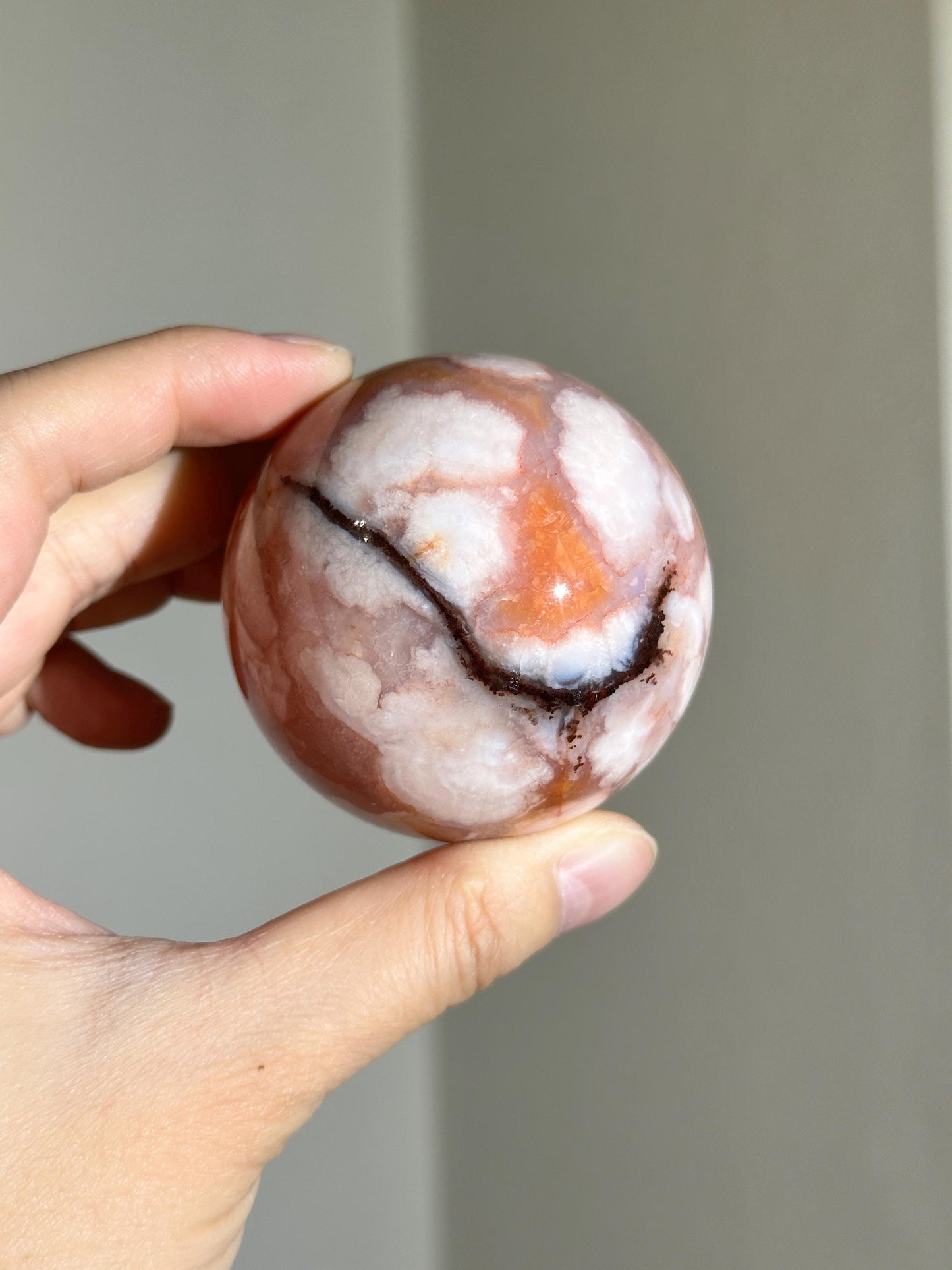 carnelian flower agate sphere with blossoming plumes