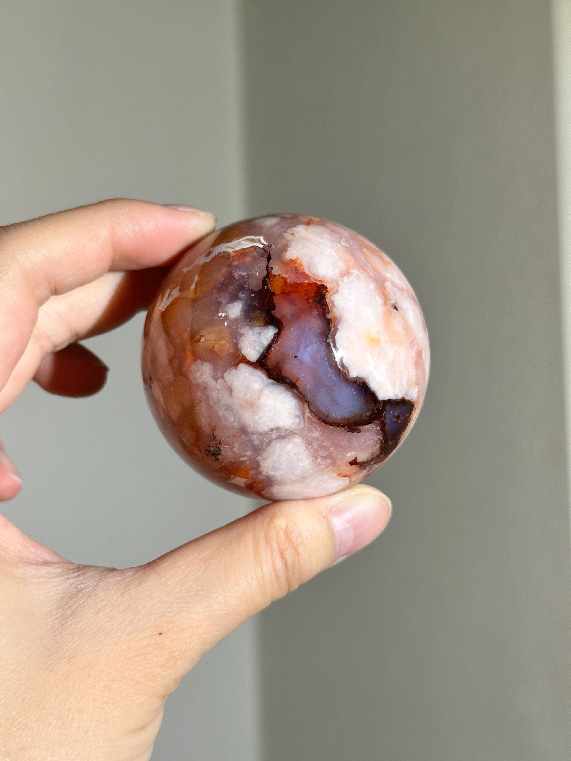 carnelian flower agate sphere with blossoming plumes