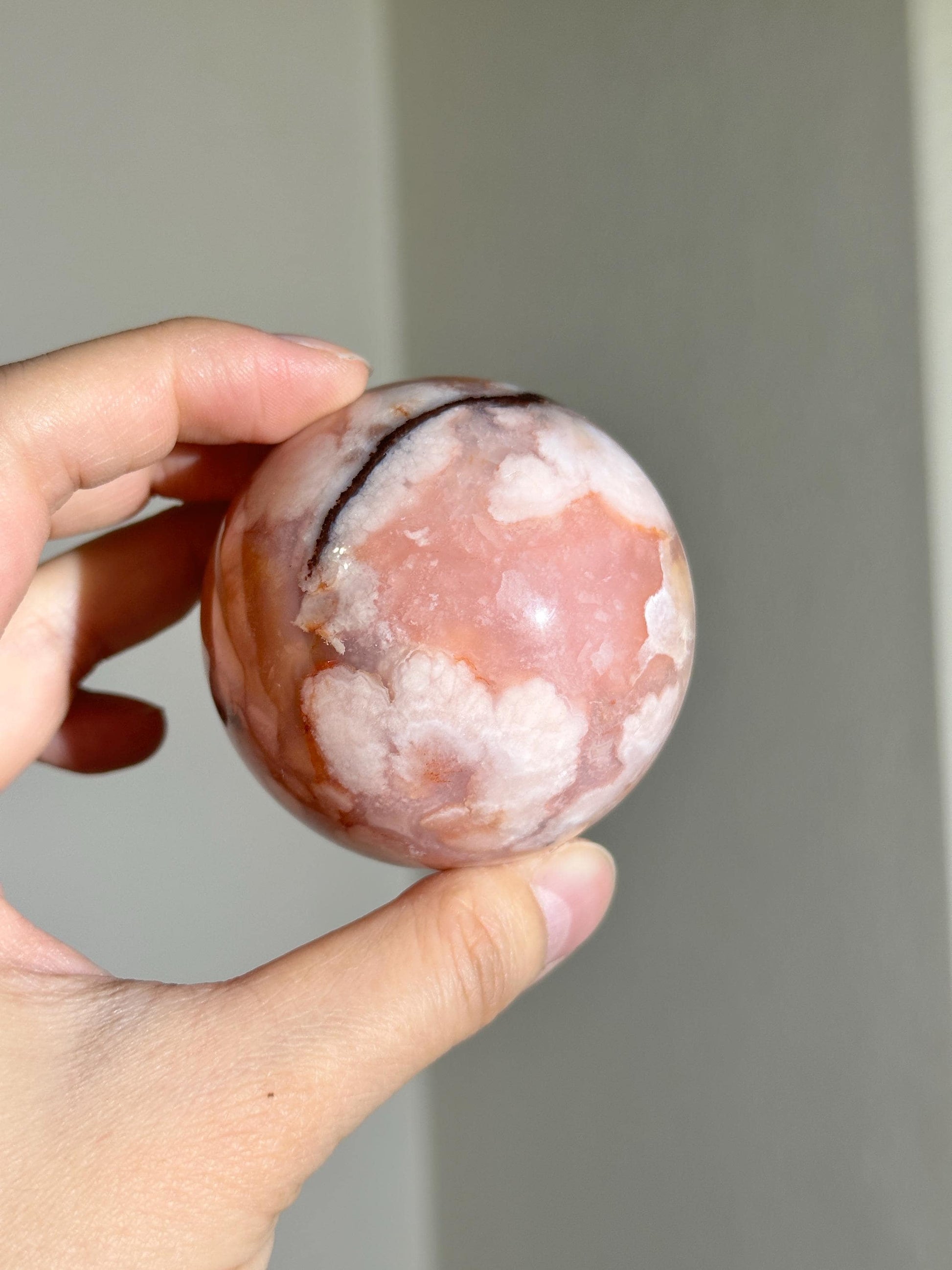 carnelian flower agate sphere with blossoming plumes