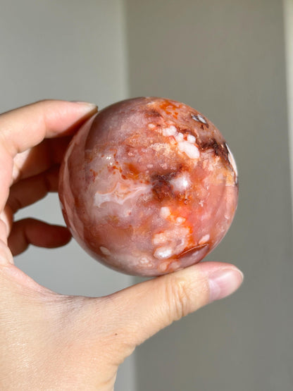 carnelian flower agate sphere with blossoming plumes