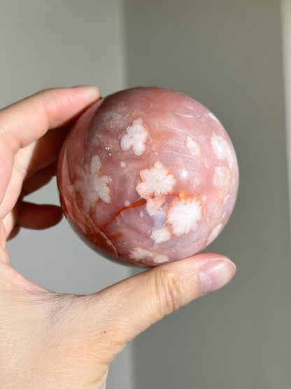 carnelian flower agate sphere with blossoming plumes