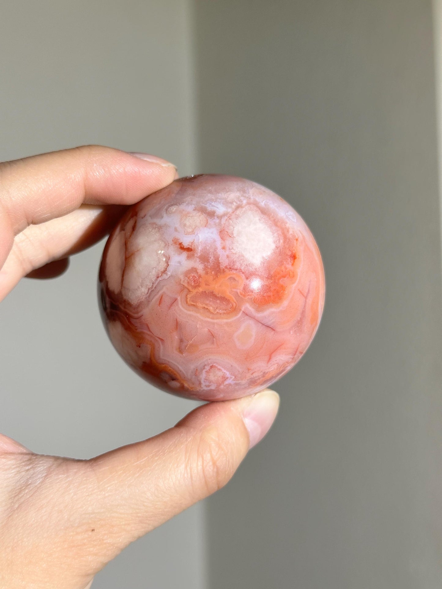 carnelian flower agate sphere with blossoming plumes